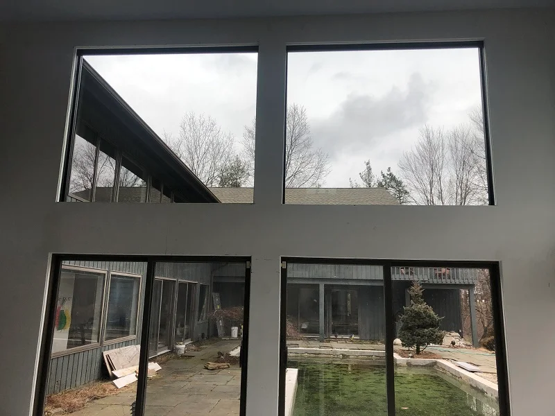 Pella Lifestyles picture windows installed over patio doors in New Canaan